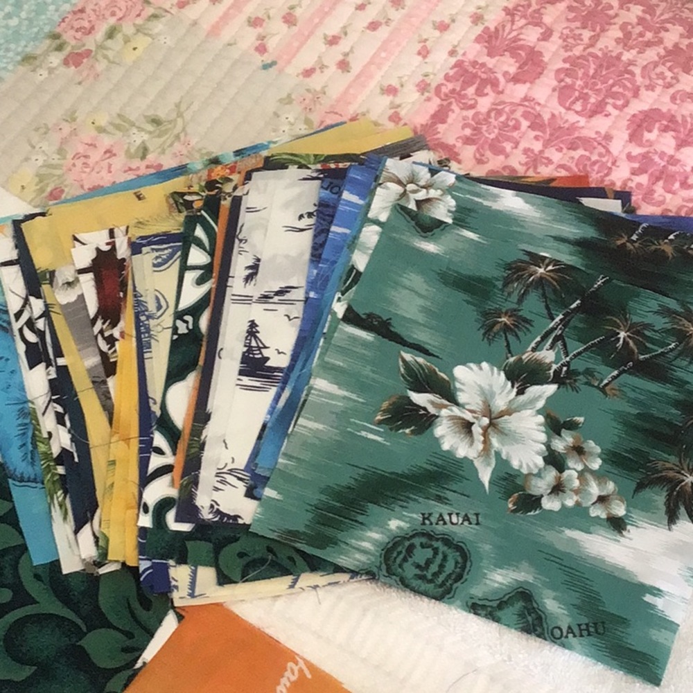 Assorted Hawaiian fabric squares7x7” Photo is items quantities vari 68 squares
